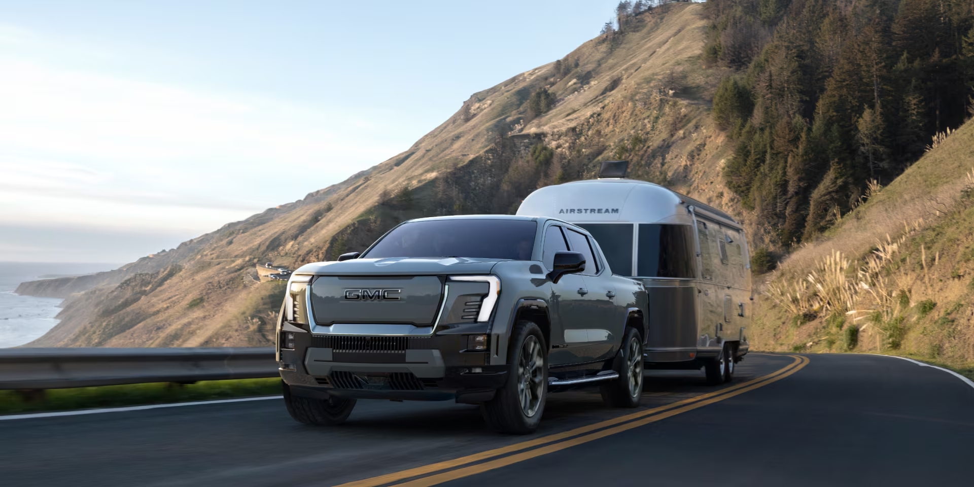 2025 GMC Sierra EV Denali towing an airstream camper
