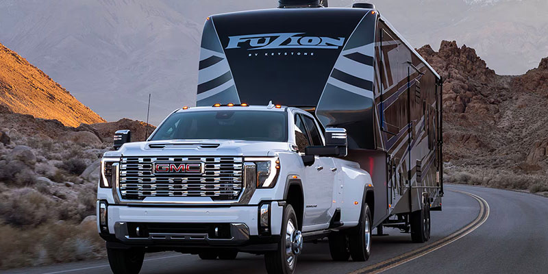 2025 GMC Sierra 3500 hauling an RV.